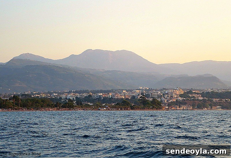 The town bathed in sunlight, A Boat Ride into the Sunset www.theboondocksblog.com