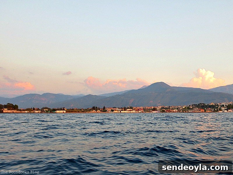 The sunlight hitting the town and clouds, A Boat Ride into the Sunset www.theboondocksblog.com