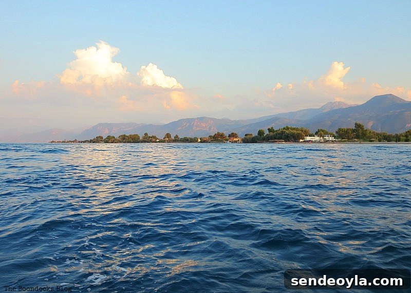 The coast viewed from the boat in the bay, A Boat Ride into the Sunset www.theboondocksblog.com
