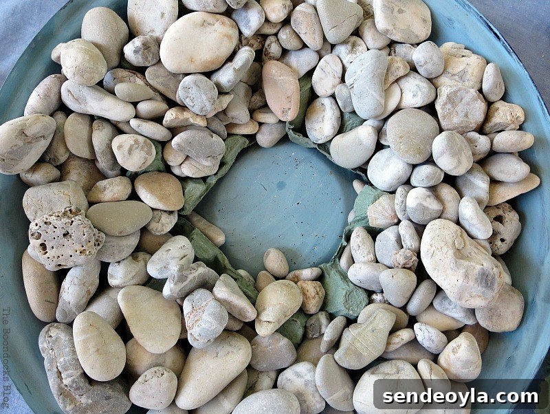 Upcycle a Grill into a Nautical Lantern 8 Putting pebbles on top of egg cartons, How to make a Nautical Lantern from a Grill - Int'l Bloggers Club Challenge www.theboondocksblog.com