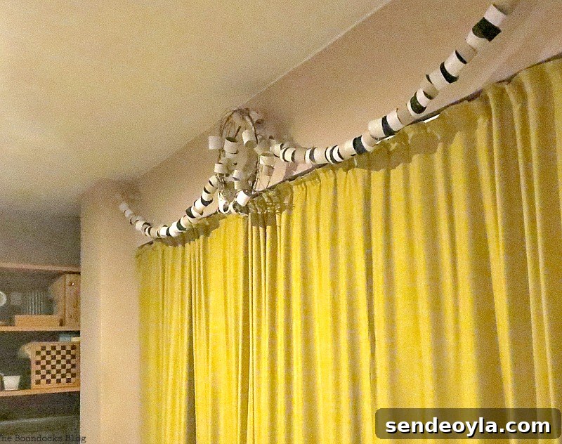 Night photo of garland and wreath on brackets