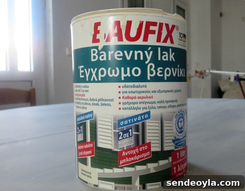 Milk Crate Table Upcycle: Stylish DIY Makeover 8 paint can of white paint with instructions written in Greek.