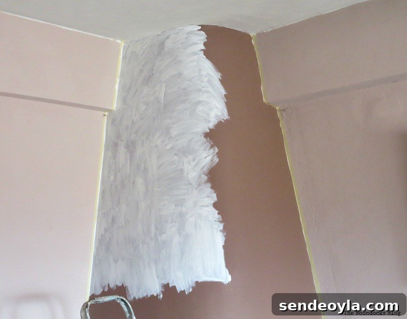 Long-Overdue Fireplace Makeover: Inspiring Before and After 3 Painting the fireplace with chalk paint, The Long Overdue Fireplace makeover www.theboondocksblog.com