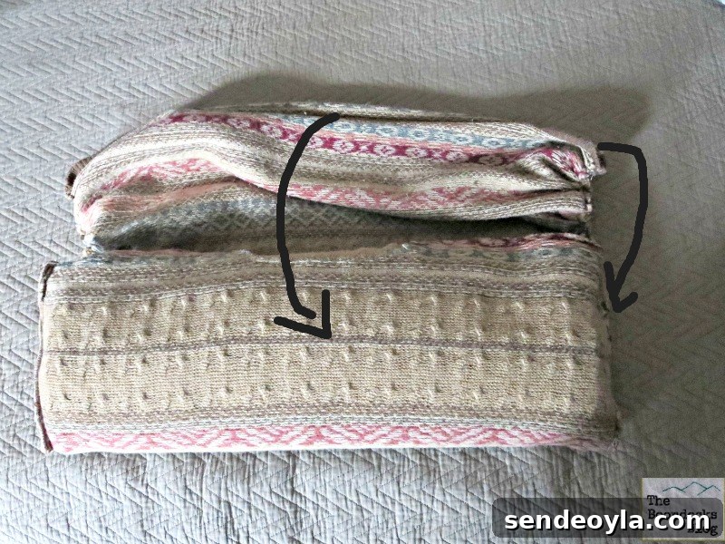 DIY Sweater Pillow Tutorial: Upcycle Old Sweaters 11 Folding into the pocket, Sweater Pillows the easy way - www.theboondocksblog.com