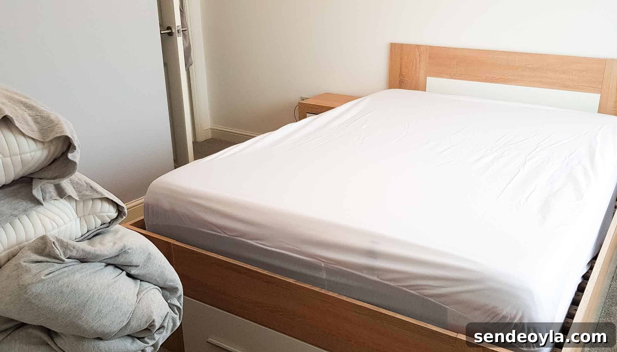protector on a tempur matress in a bedroom
