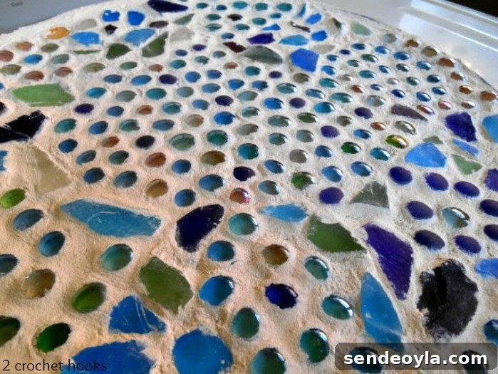 Close up of the sea glass and marble table top.