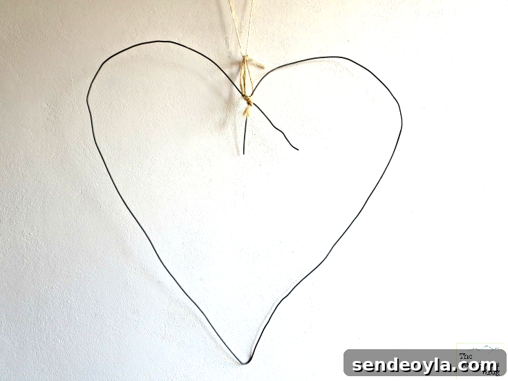 DIY Heart Wreath from Toilet Paper Rolls 4 Wire bent in the shape of a heart.