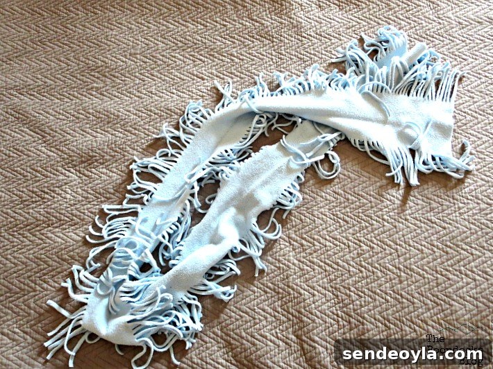DIY Minimal-Sew Fleece Pillow 3 Fringed fleece scarf ready to be repurposed