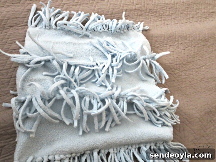 DIY Minimal-Sew Fleece Pillow 8 Forming a pocket with the tied fleece scarf