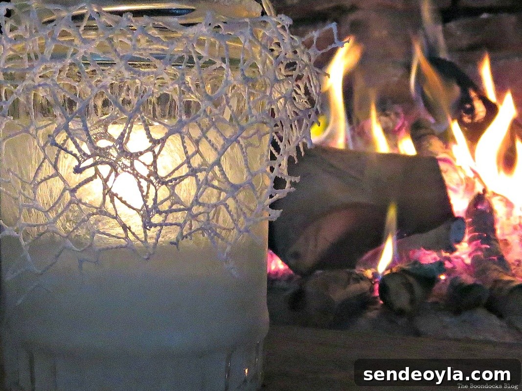 A lit tea light decorated with crystal ice spray, the snow spray that wasn't - the boondocks blog 