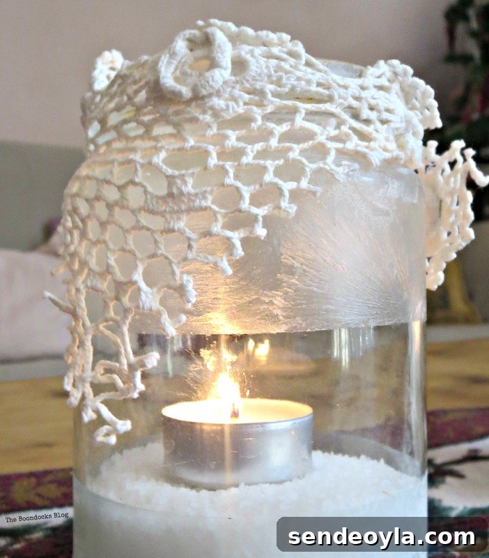 Lit tea light decorated with crochet lace and crystal ice s pray , the snow spray that wasn't - the boondocks blog