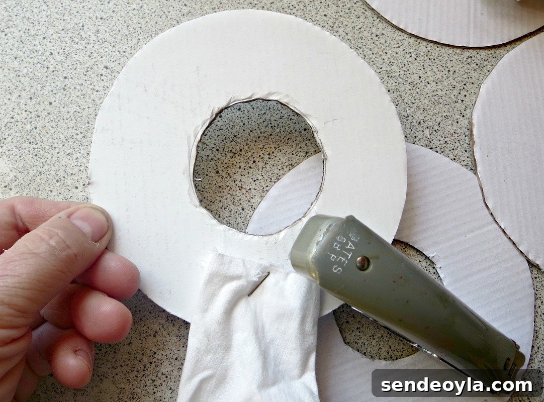 DIY Upcycled Christmas Ornaments from Scrap Ribbon 5 Fabric wrapped around cardboard ring