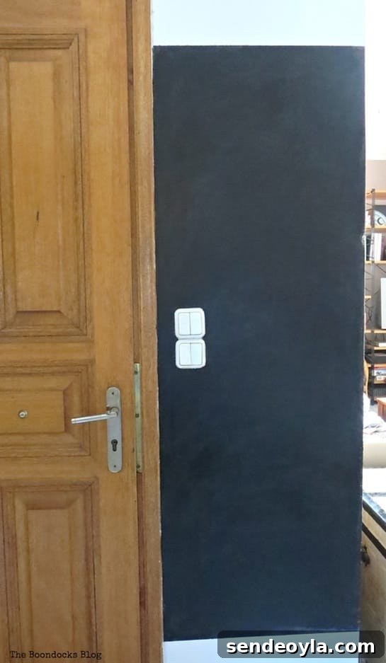 Blackboard wall after 4 coats of paint, Seeing black www.theboondocksblog.com