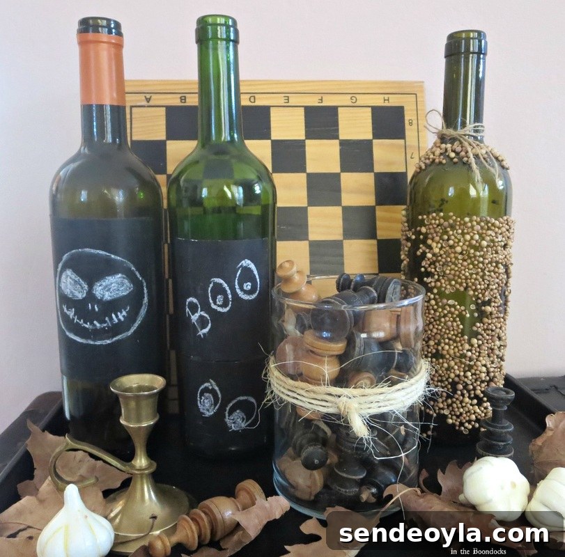 3 bottles painted with chalkboard paint, The Chalkboard Fall Vignette www.theboondocksblog.com